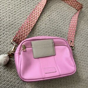 Elegant Pink Crossbody Bag with Patterned Strap